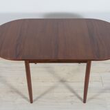 Table à manger en palissandre extensible danoise du milieu du siècle, années 1960