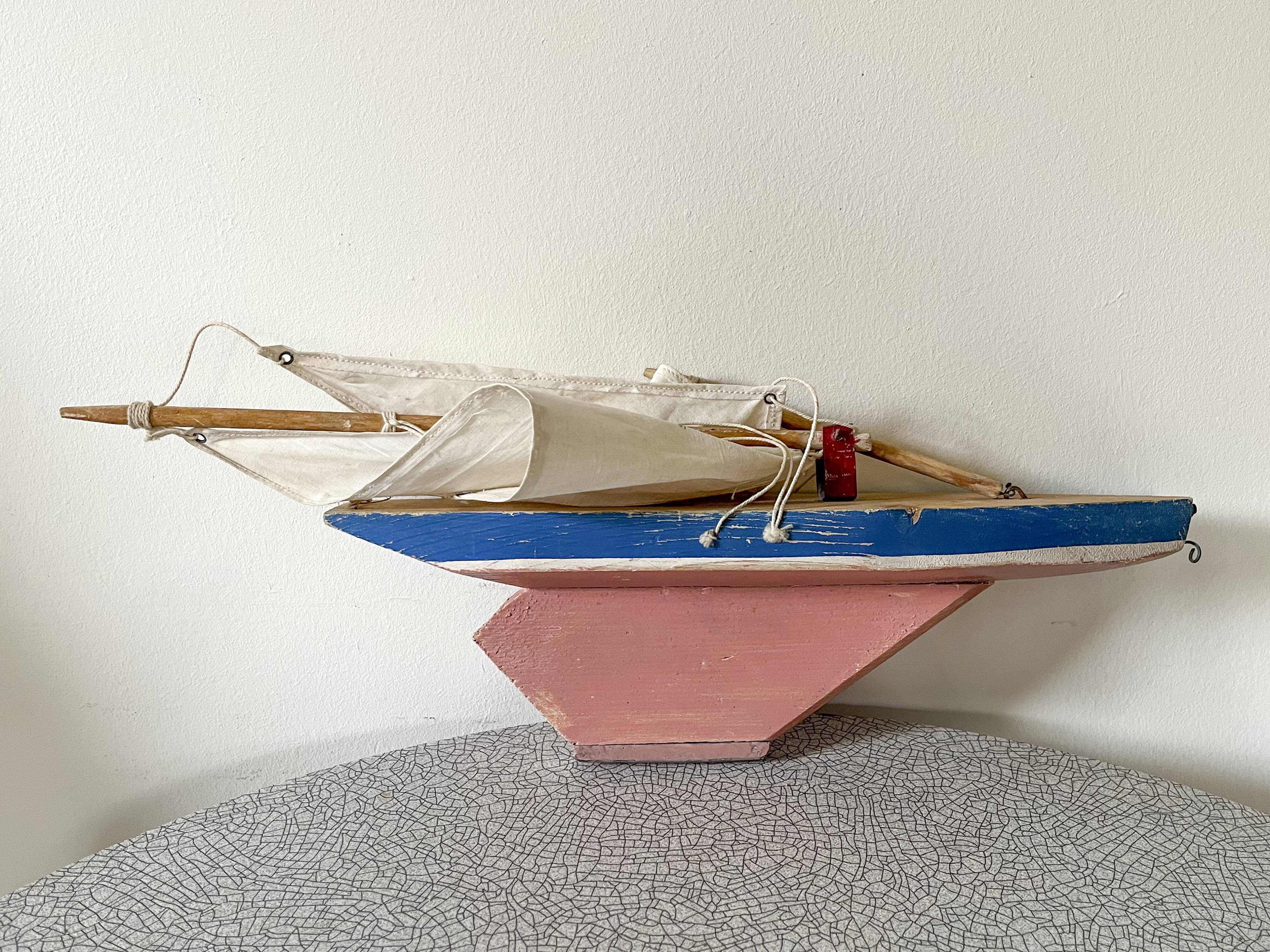Navigable wooden basin sailboat, toy attributed to the jab granville brand