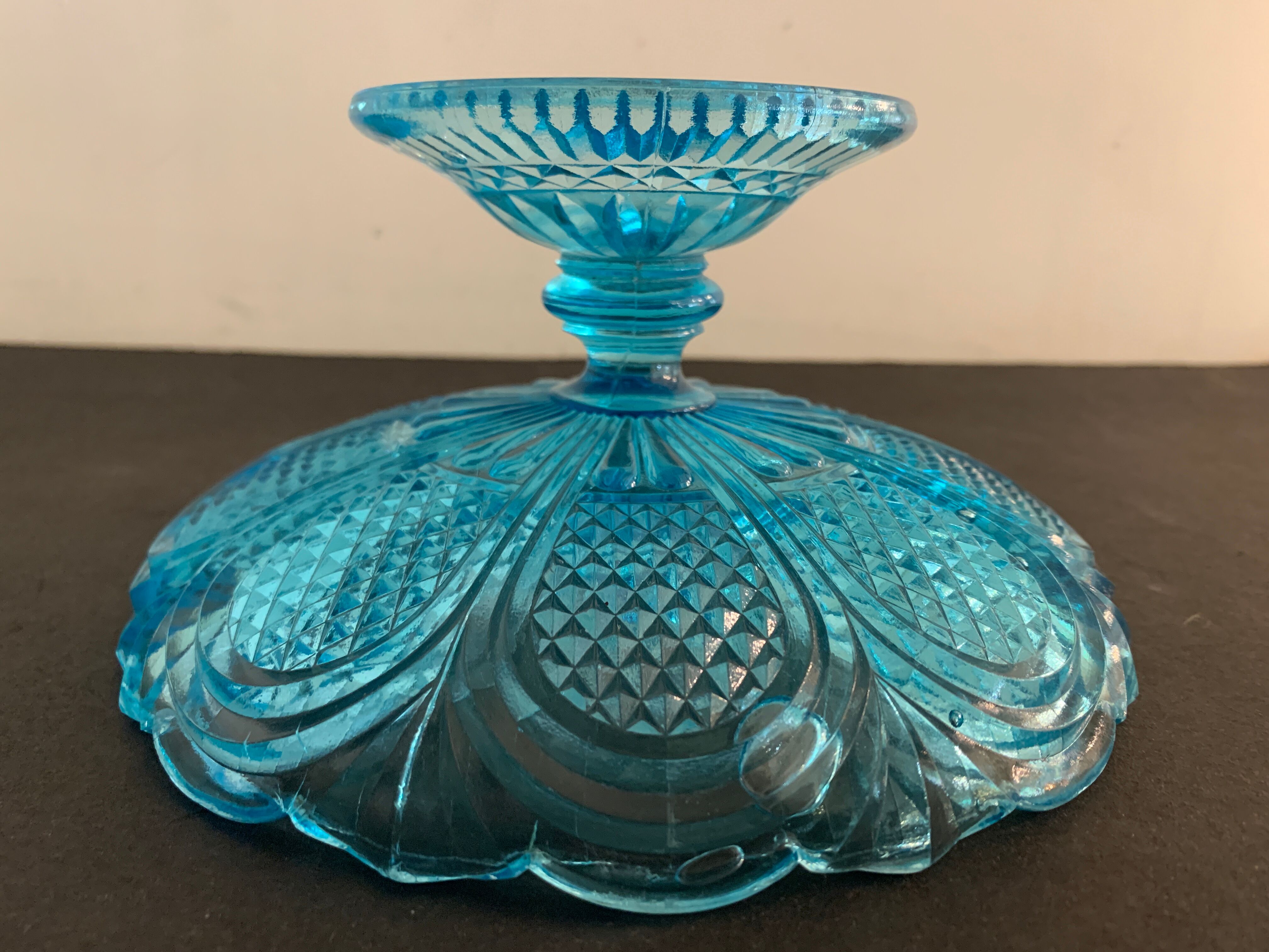 Fruit cup on blue-bubbled glass peder