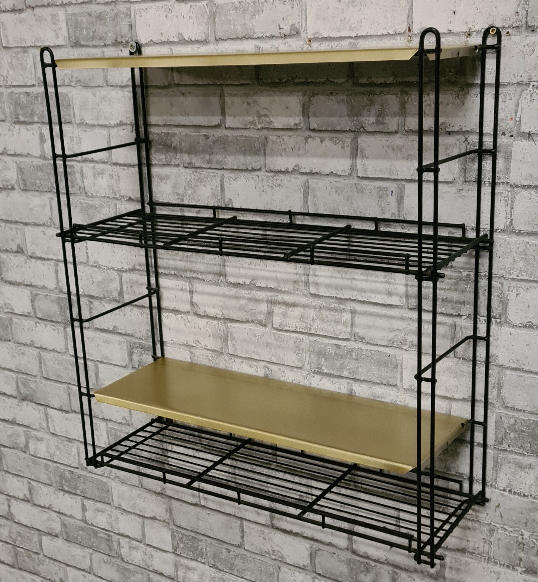 Bronze and black metal shelf 1970