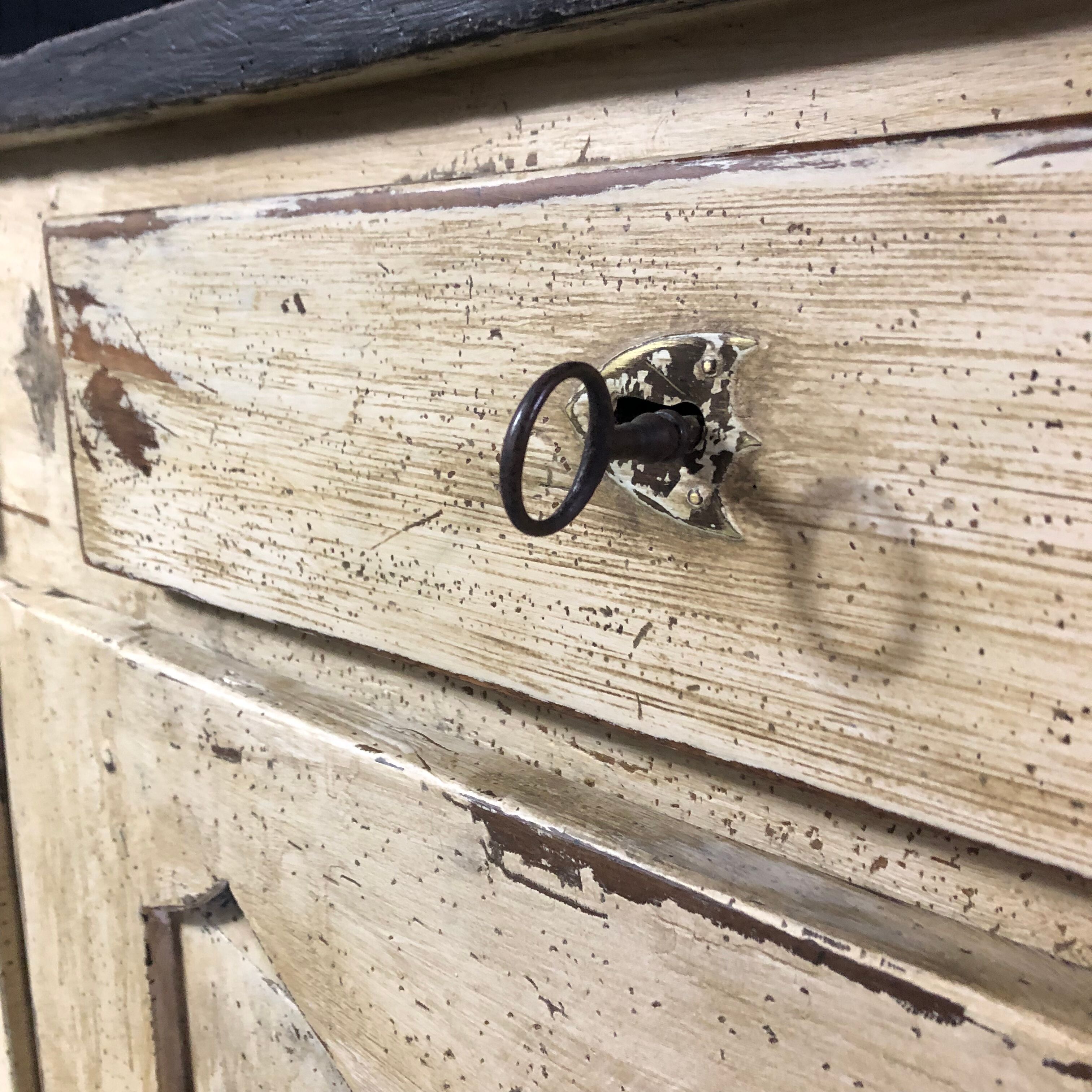 Old patinated painted wooden sideboard