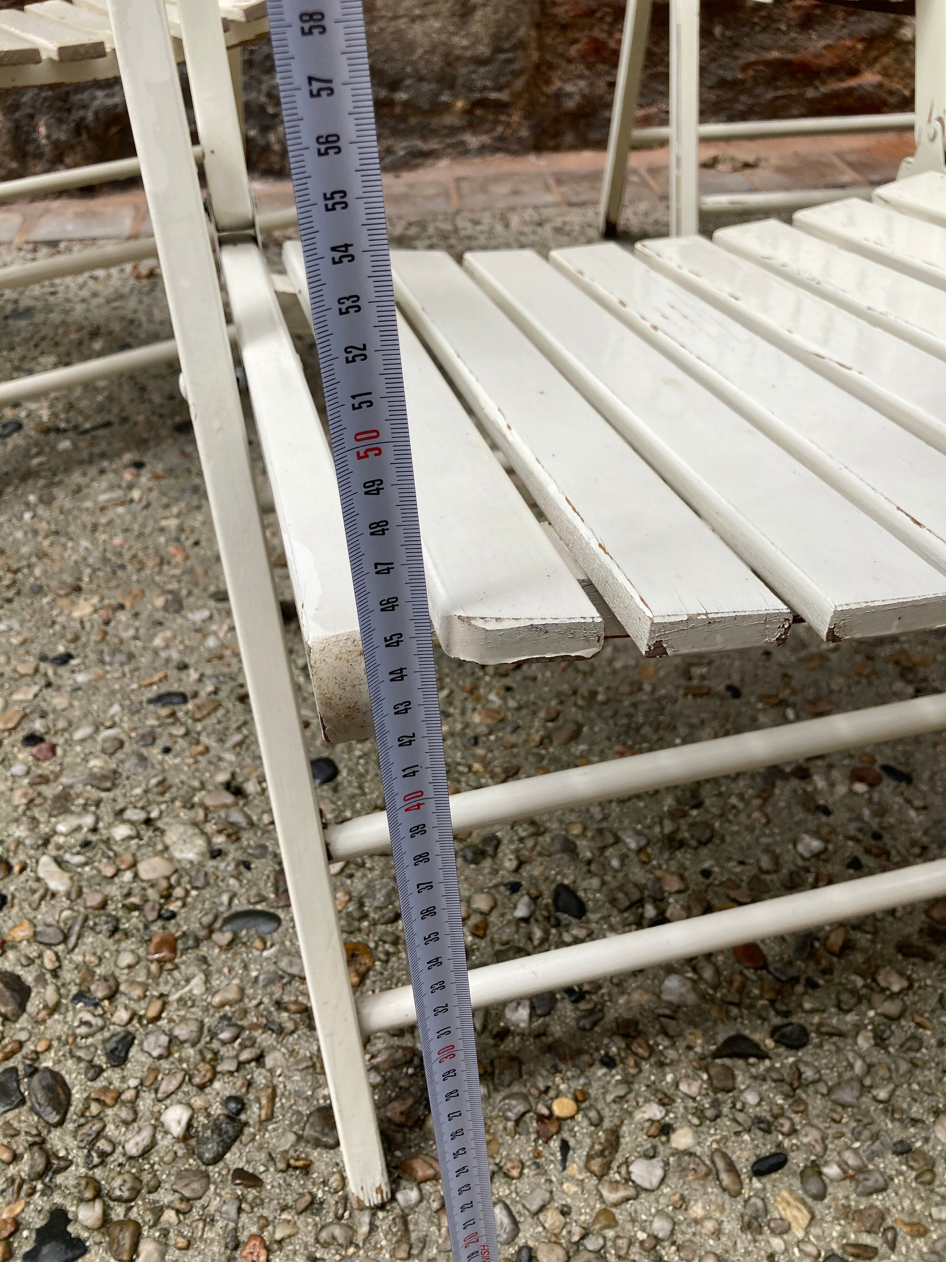 Five wooden garden armchairs