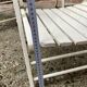Five wooden garden armchairs