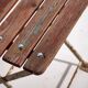 Antique red folding garden chairs (circa 1920). Set of 4 pieces