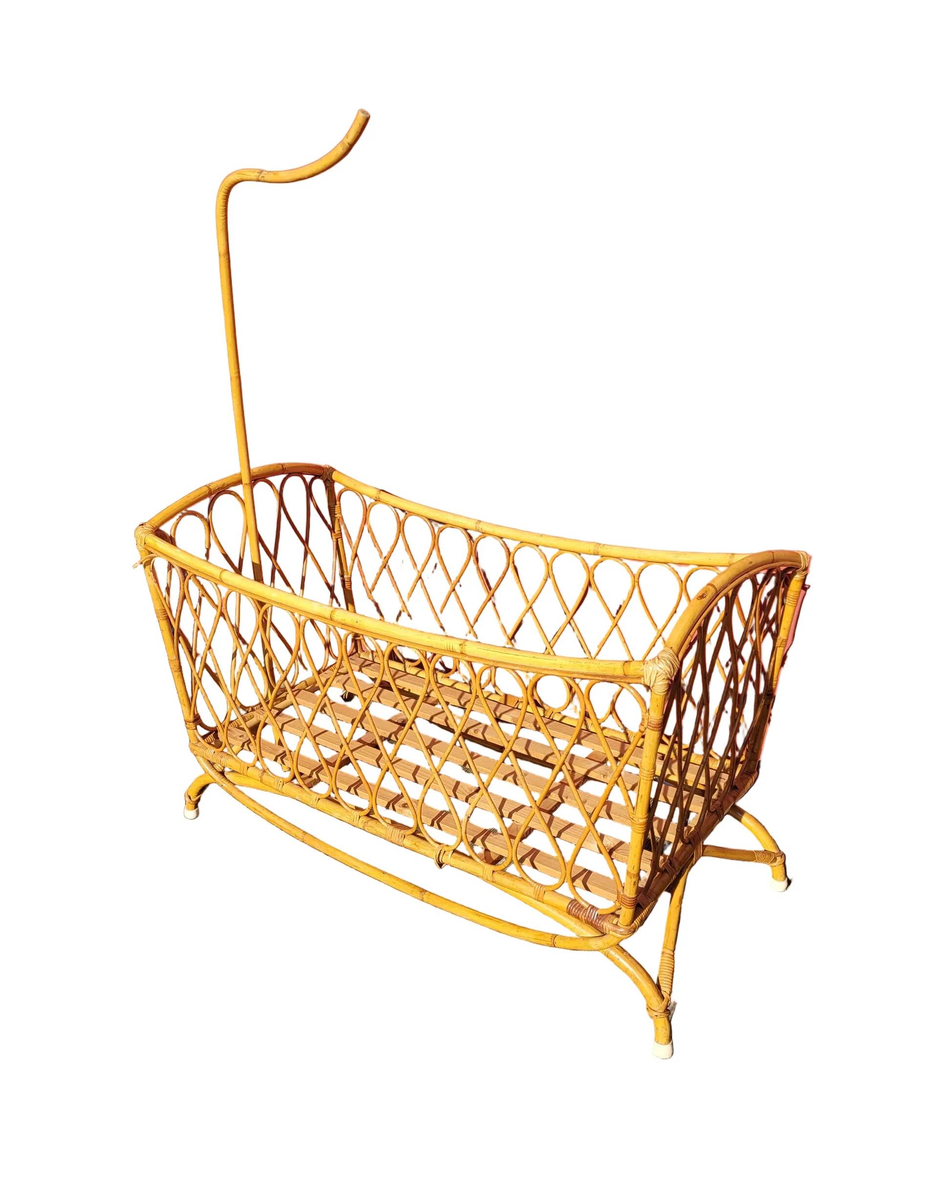 Bamboo and rattan baby cot with canopy.