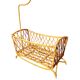 Bamboo and rattan baby cot with canopy.