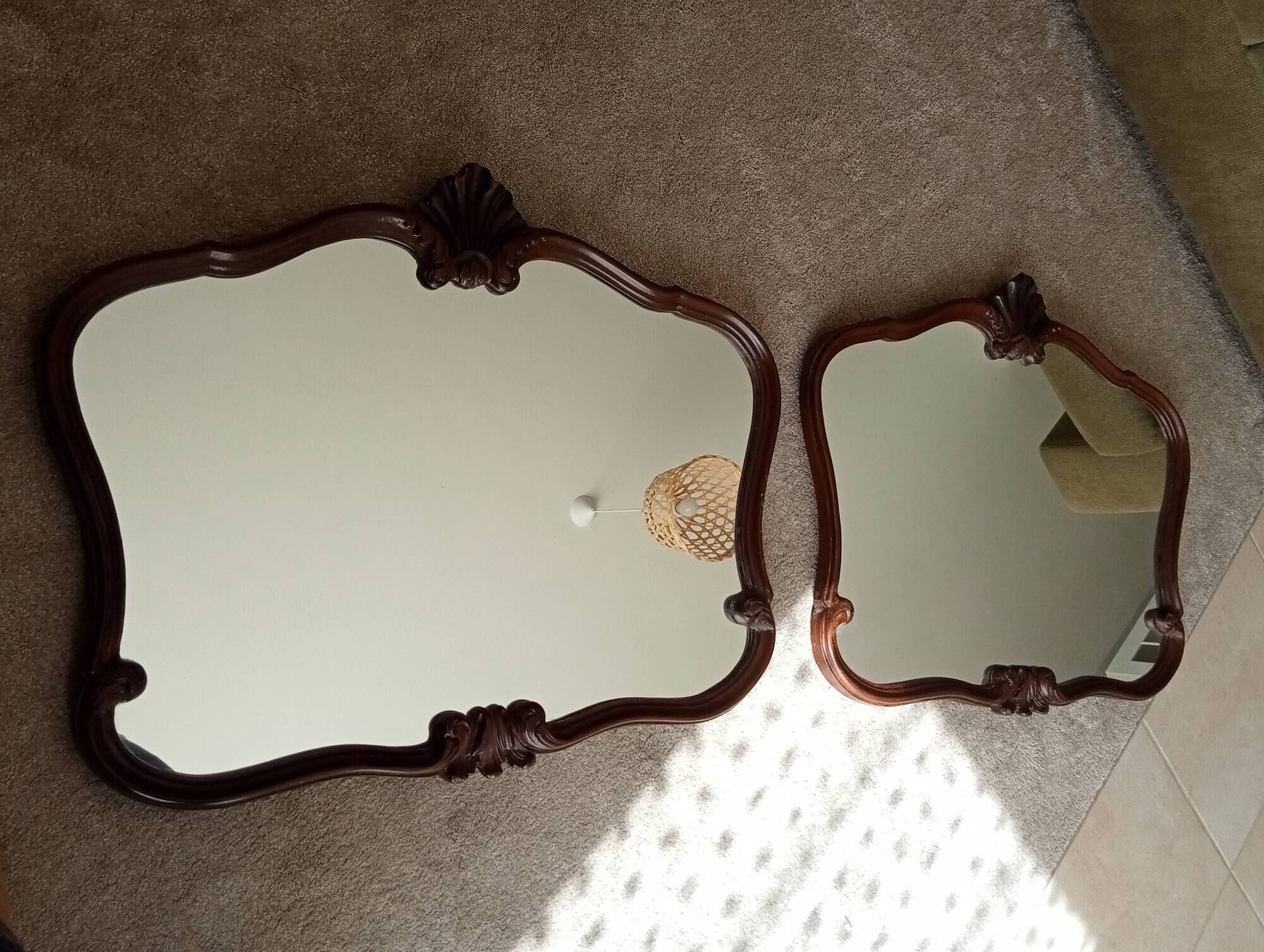 Pair of large antique Rococo style Louis XV mirrors in carved solid wood.