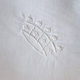 scalloped pillowcase decorated with a baron's crown