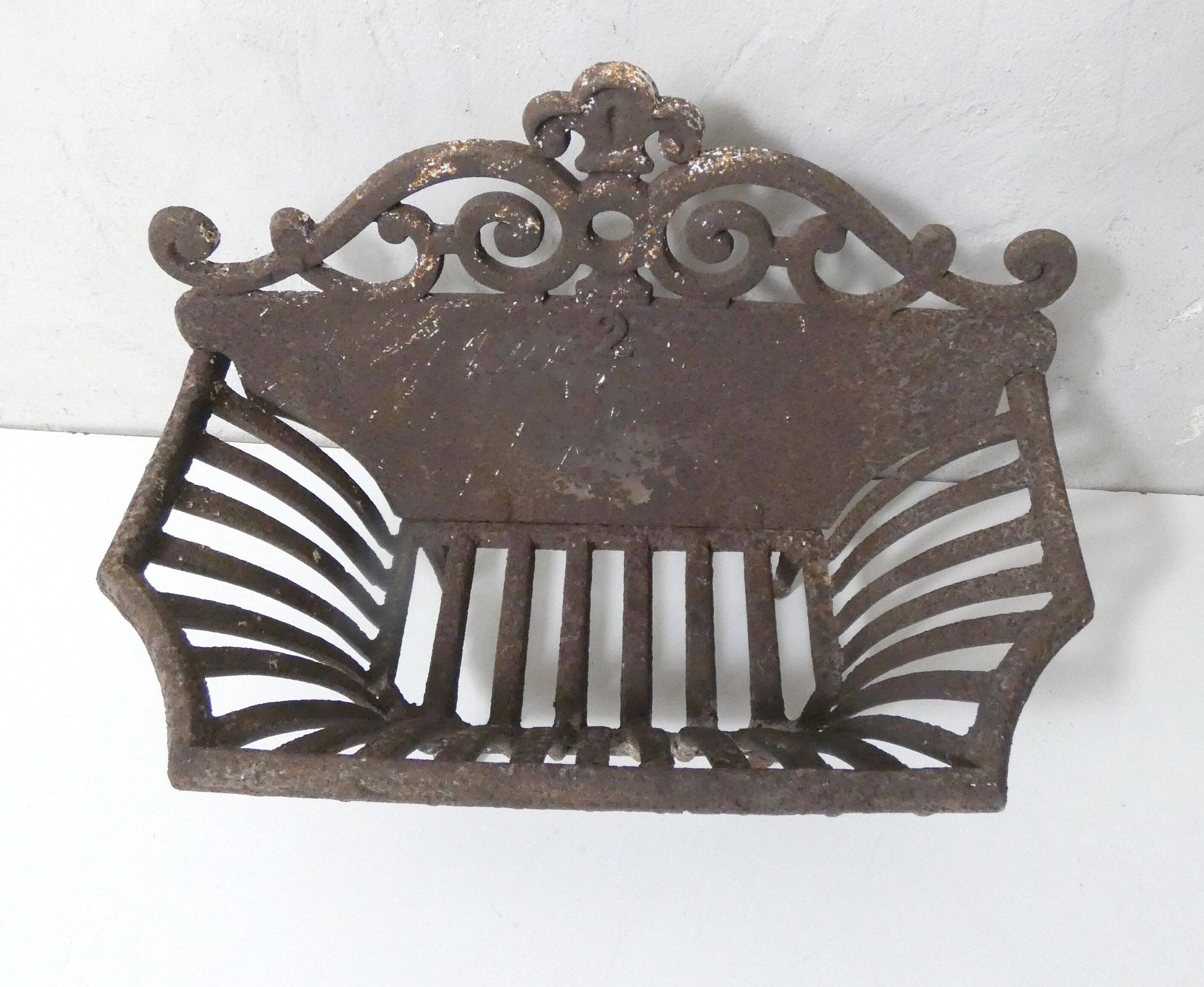 vintage cast iron log holder