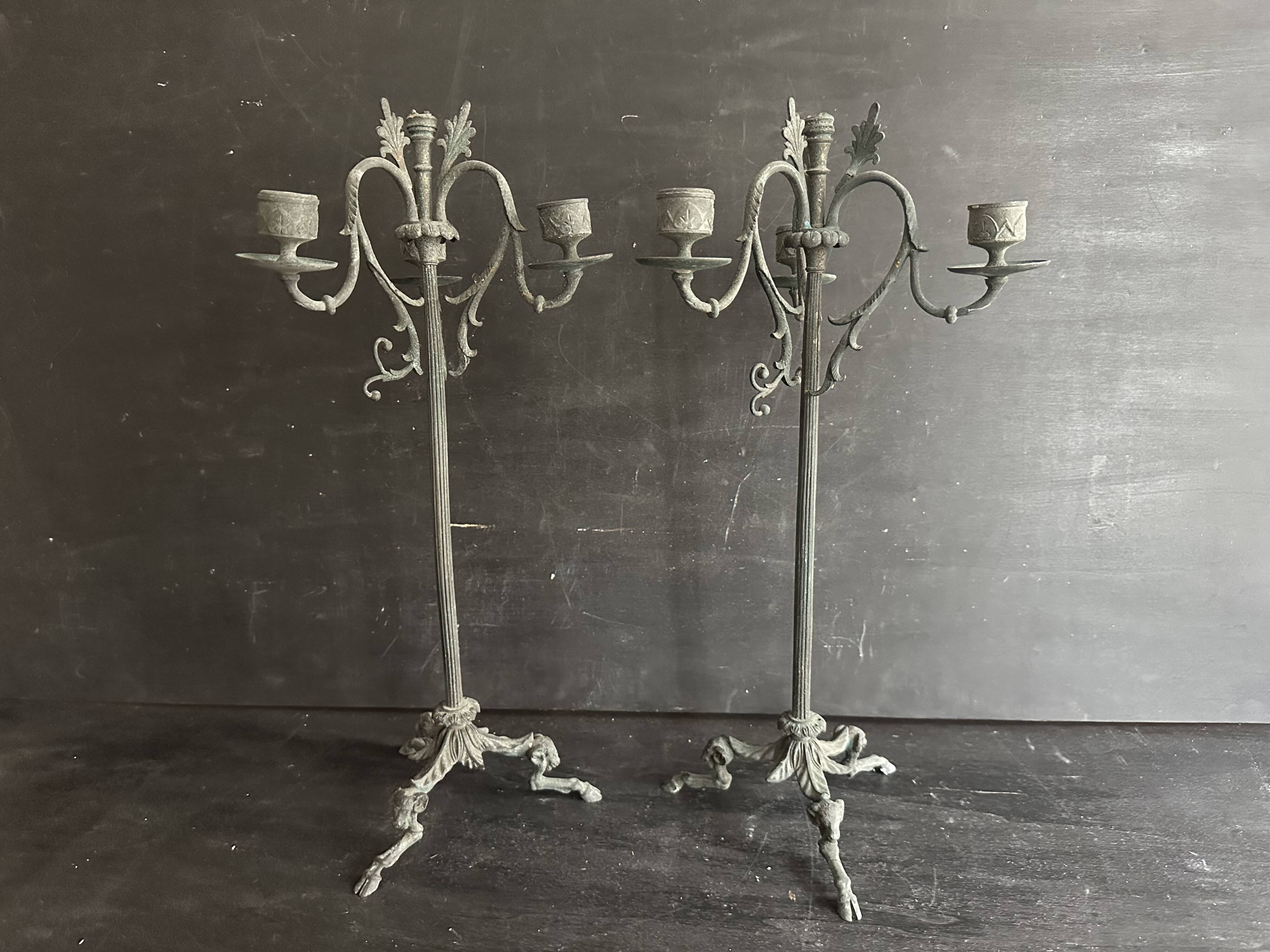 Pair of large Napoleon III candlesticks in patinated bronze