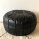 Contemporary leather full black pouf