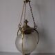 Suspension in bronze and engraved glass