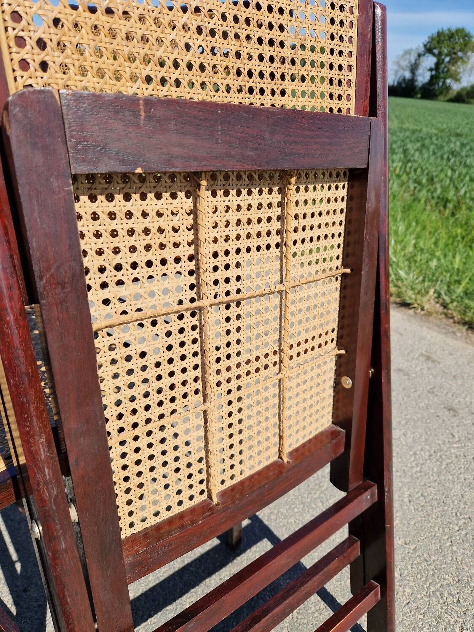 Lot de 2 chaises pliantes en bois et cannage
