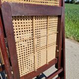 Set of 2 folding chairs in wood and cane.