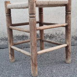 Vintage handmade wooden stool and rope
