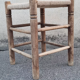 Vintage handmade wooden stool and rope