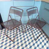 Paire de chaises pliantes en tôle perforée