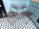 Pair of folding chairs in perforated sheet metal
