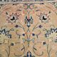 Antique Turkish wool rug in faded floral patterns, 10 x 13 feet.