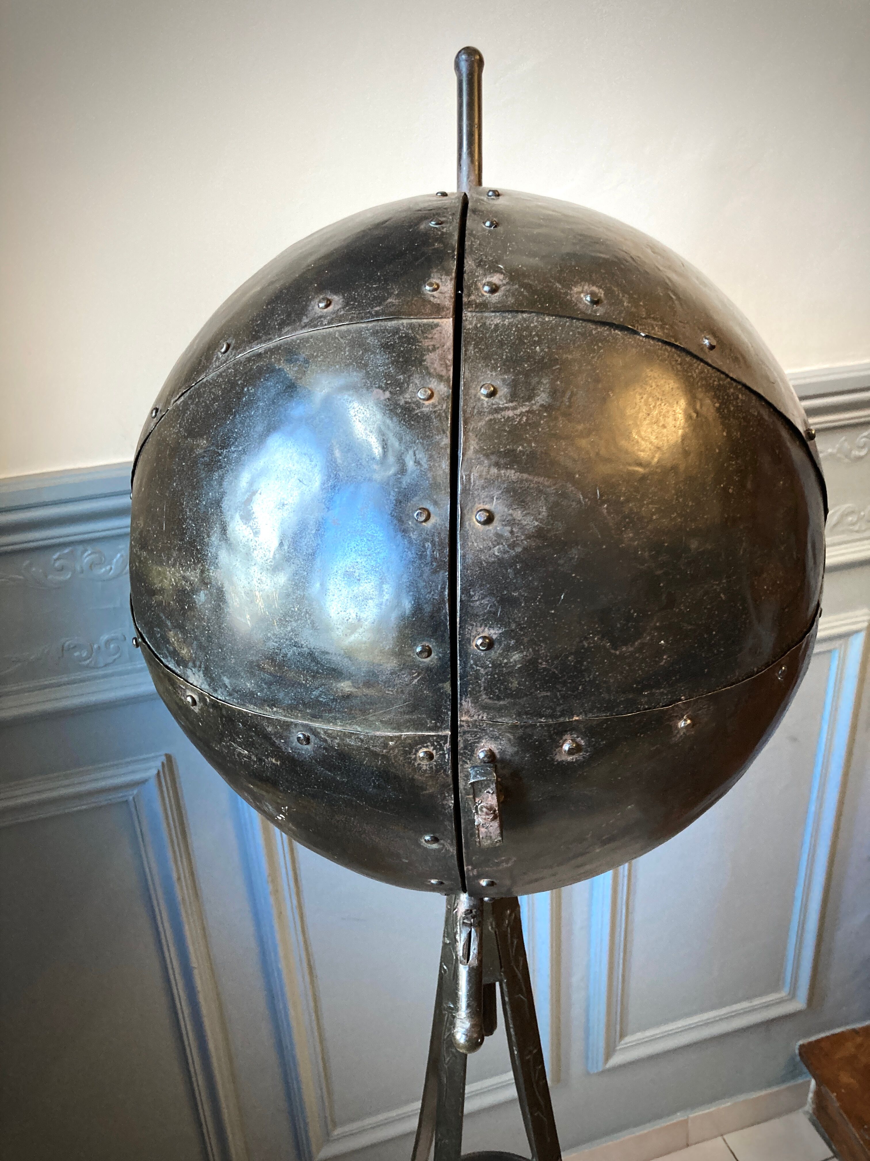 Atypical industrial furniture riveted sphere