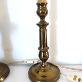 Deux pieds de lampes bougeoir et pique cierge anciens