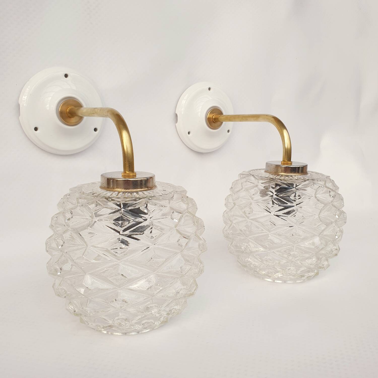Swan neck and glass wall lights