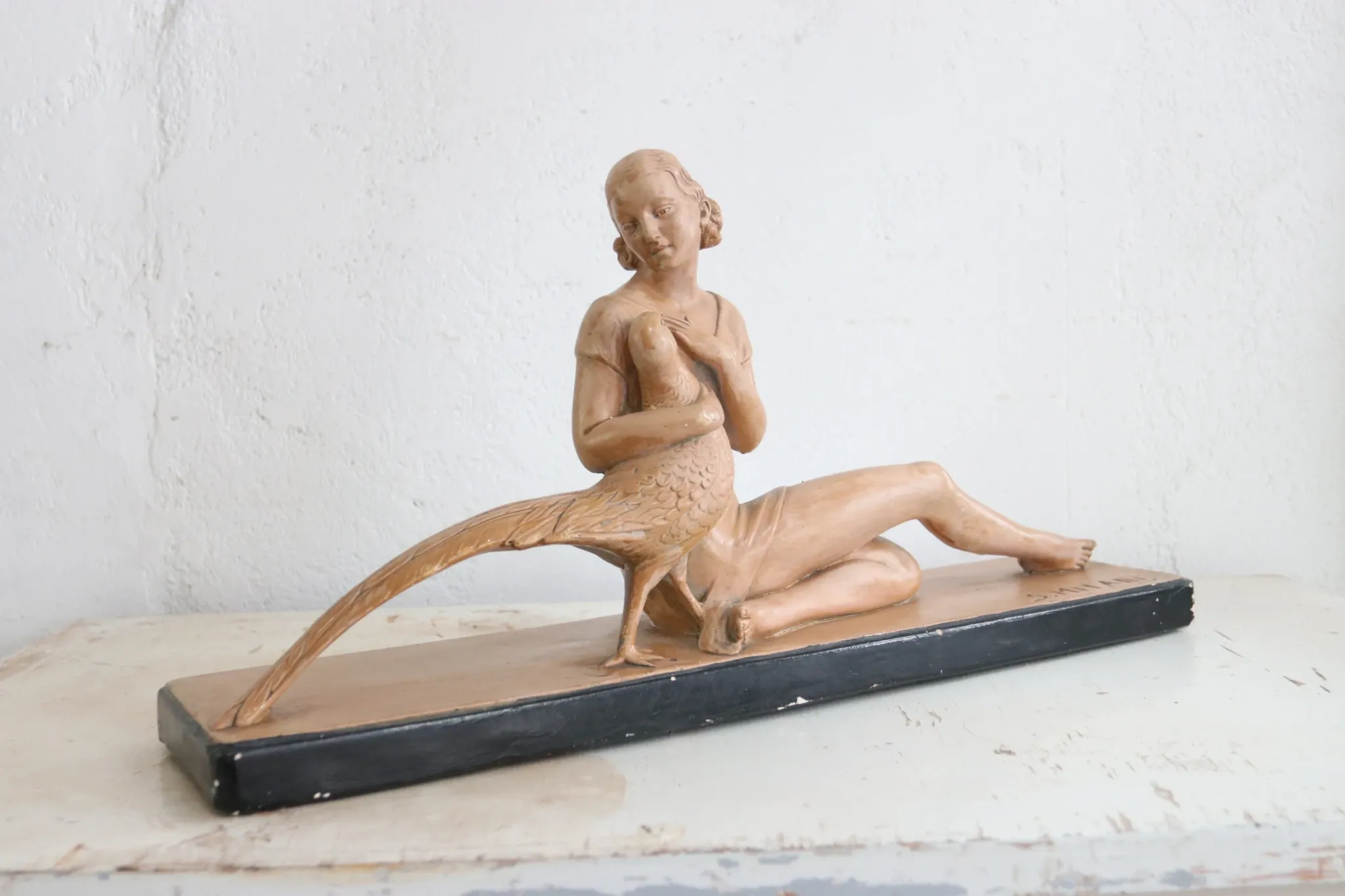 Salvatore Melani – Art Deco woman with pheasant, painted plaster, 1930s