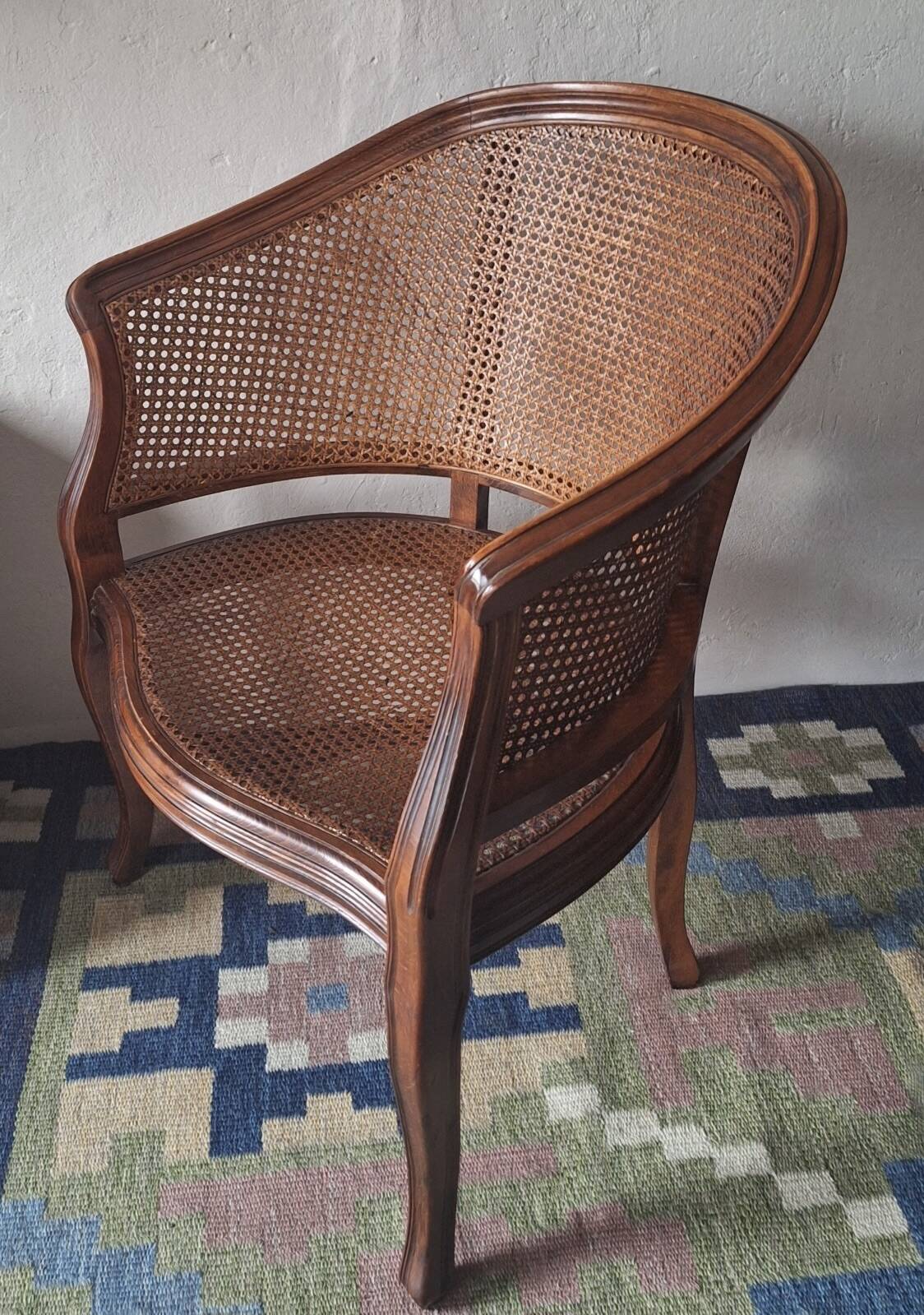 Half-moon rattan and hardwood armchair, early 20th century