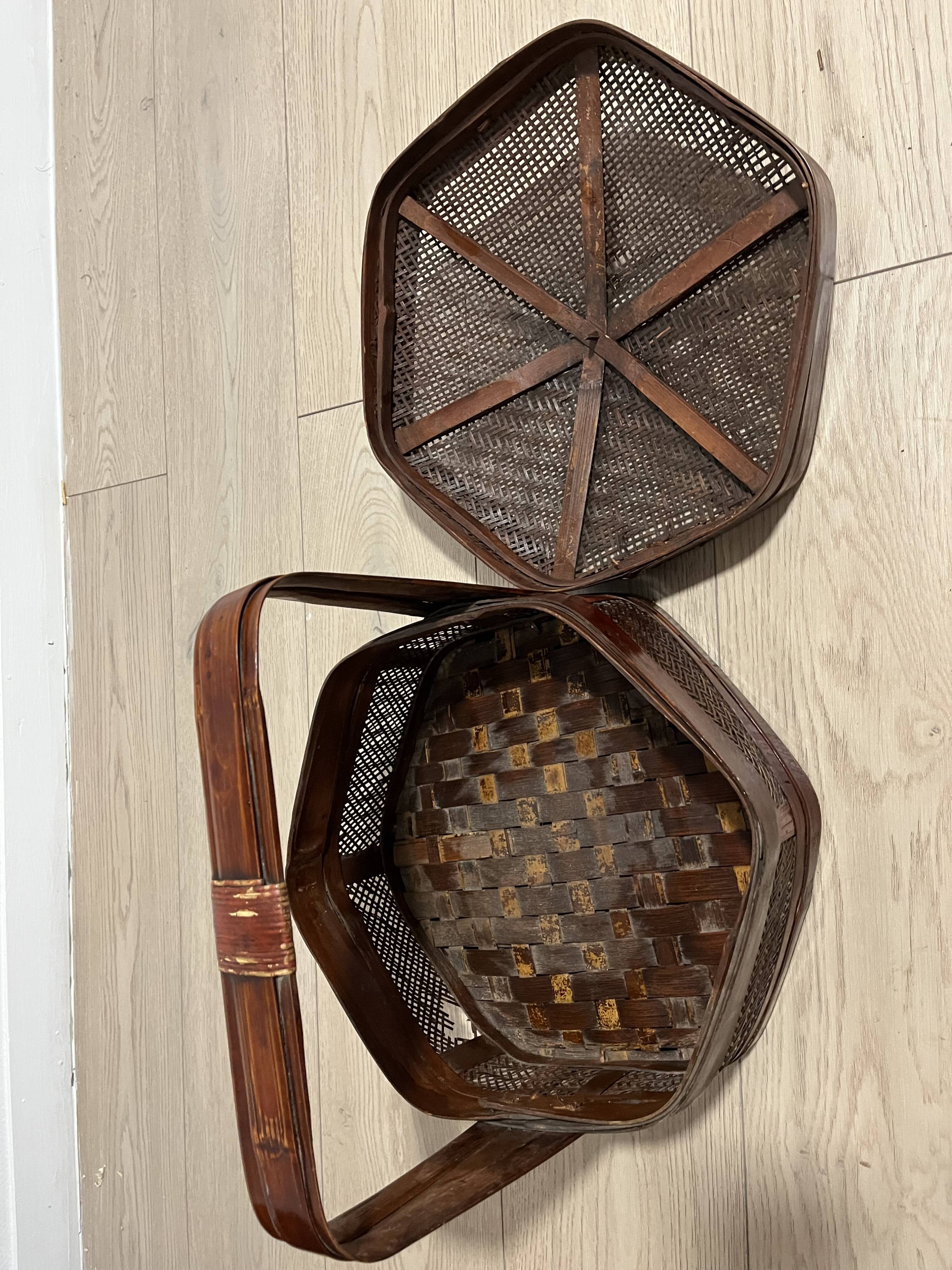 Ancient wooden and woven wicker basket,