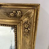 Miroir de style Louis XVI en bois et stuc doré XIX siècle
