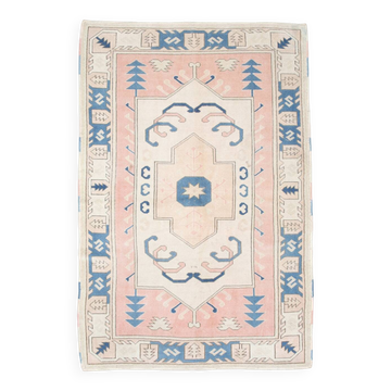 Tapis vintage en laine et coton pêche et bleu