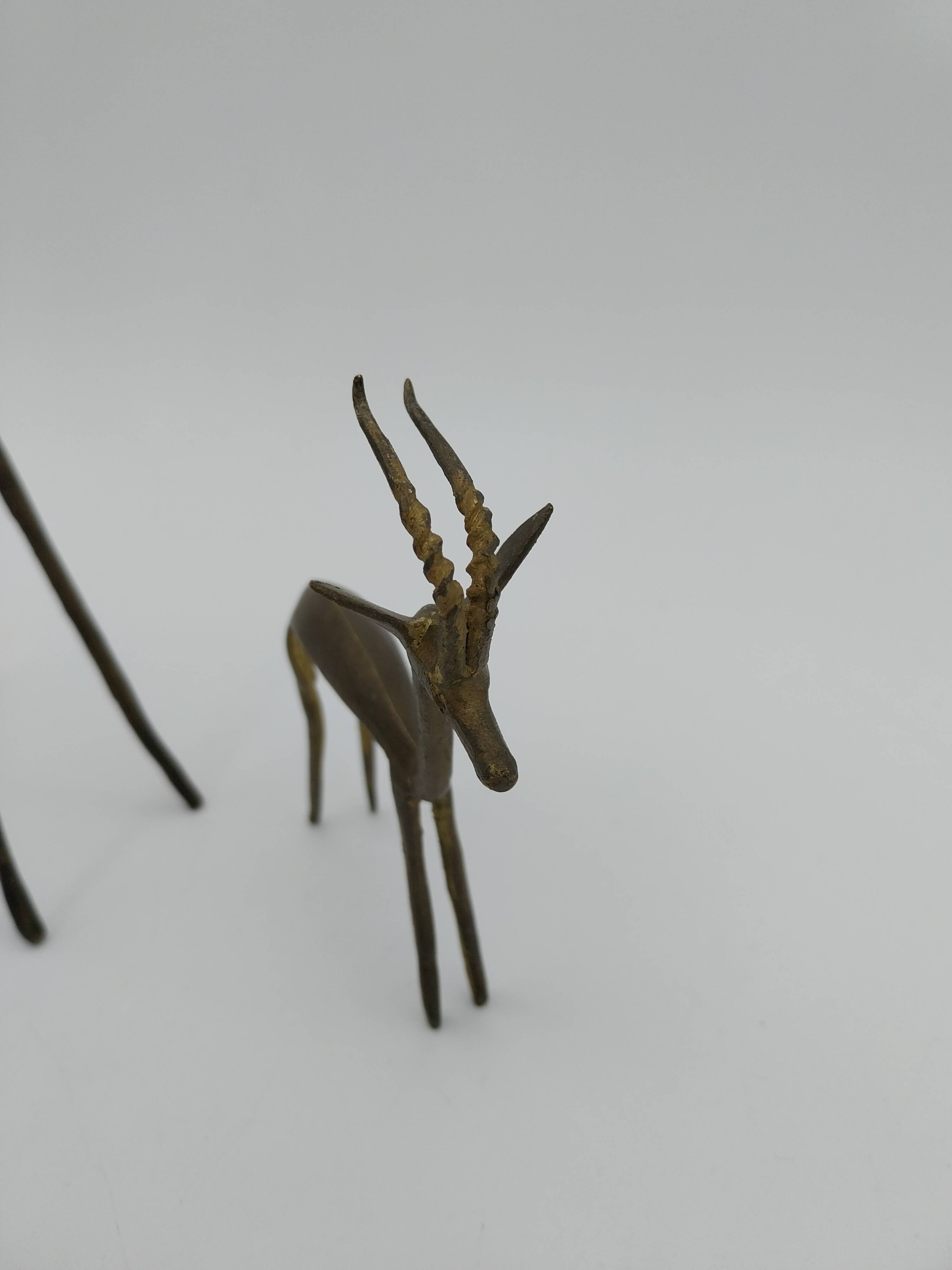 African brass animals giraffe and gazelle