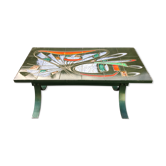 Table basse vintage en céramique à piétement en x métallique