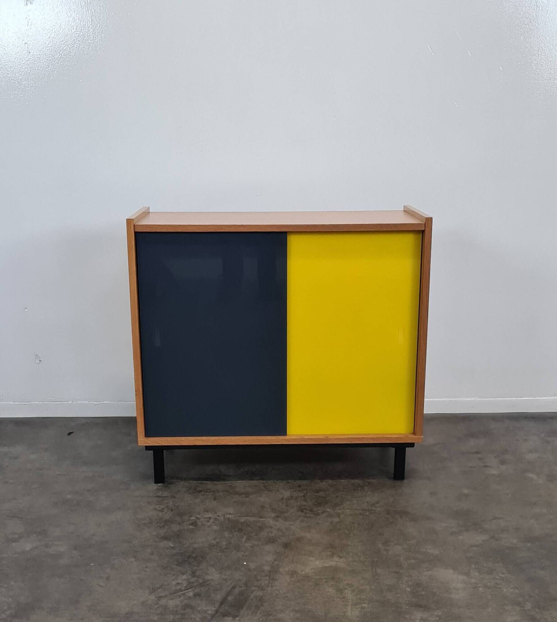 Vintage furniture with coloured glass.