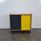 Vintage furniture with coloured glass.