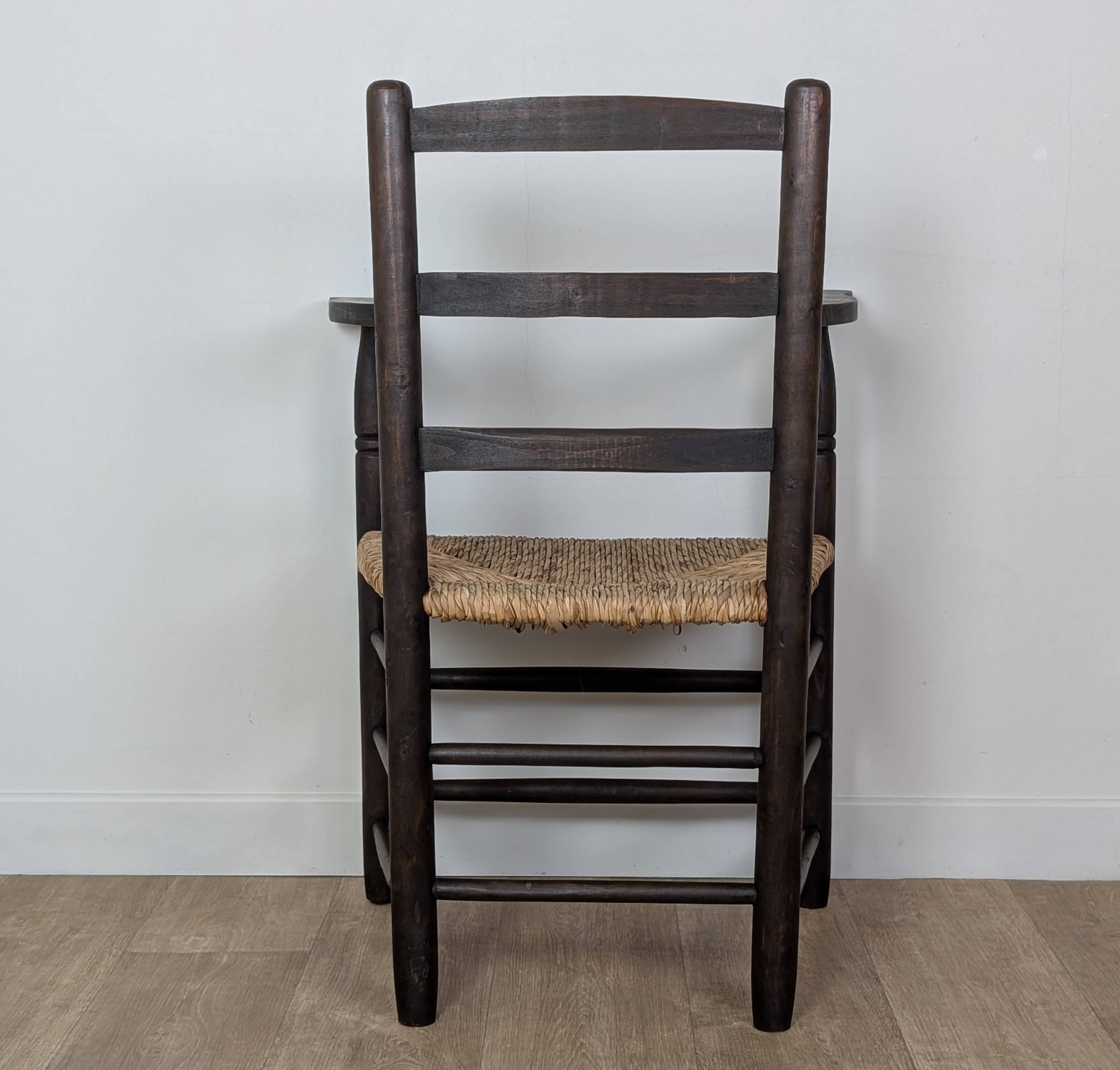 Wooden straw armchair