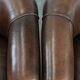 Set of two sheepskin club armchairs with fixed seat cushions