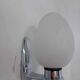 Pair of opaline chrome wall lights from the 70s.
