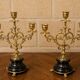 Elegant pair of three-light candelabra in gilded bronze.
