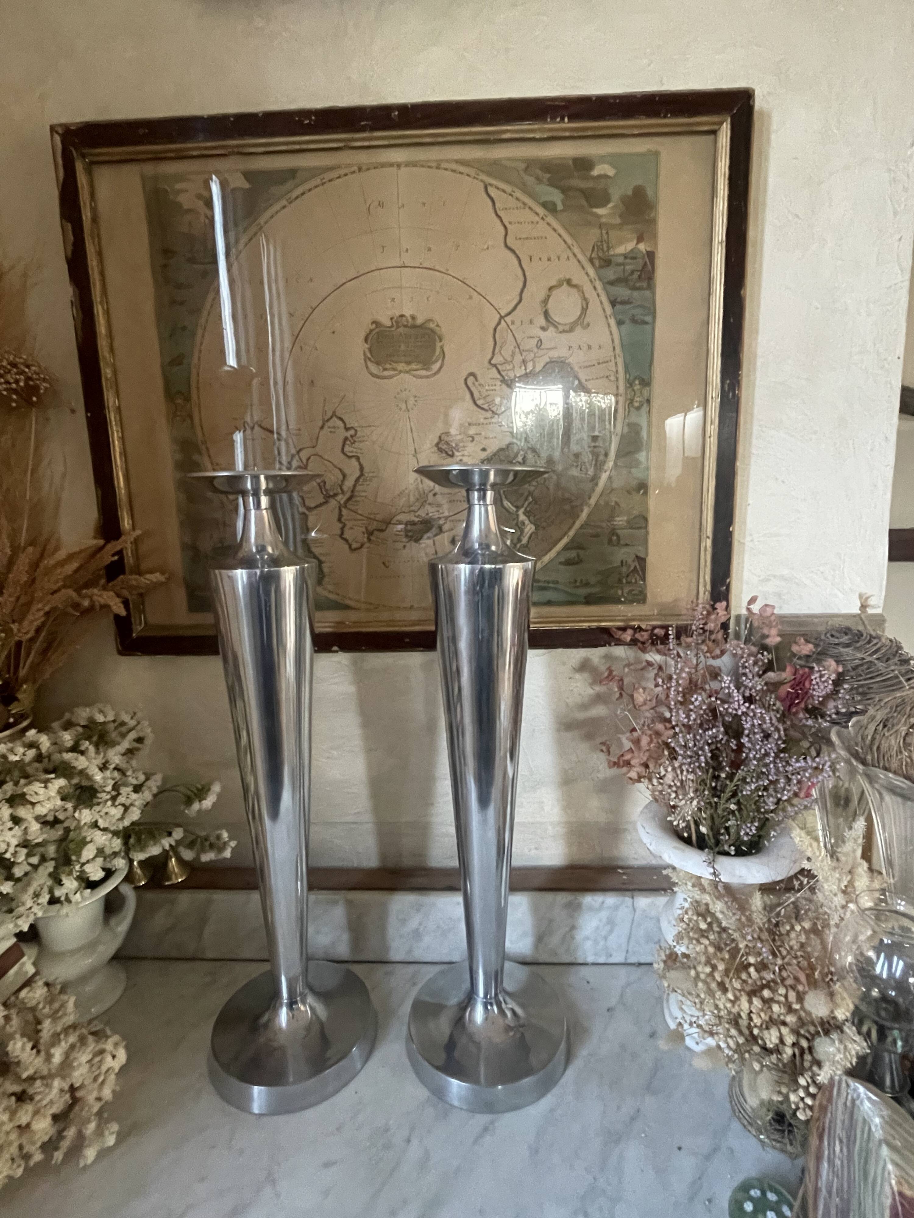 Pair of aluminium cast candle holders 52cm