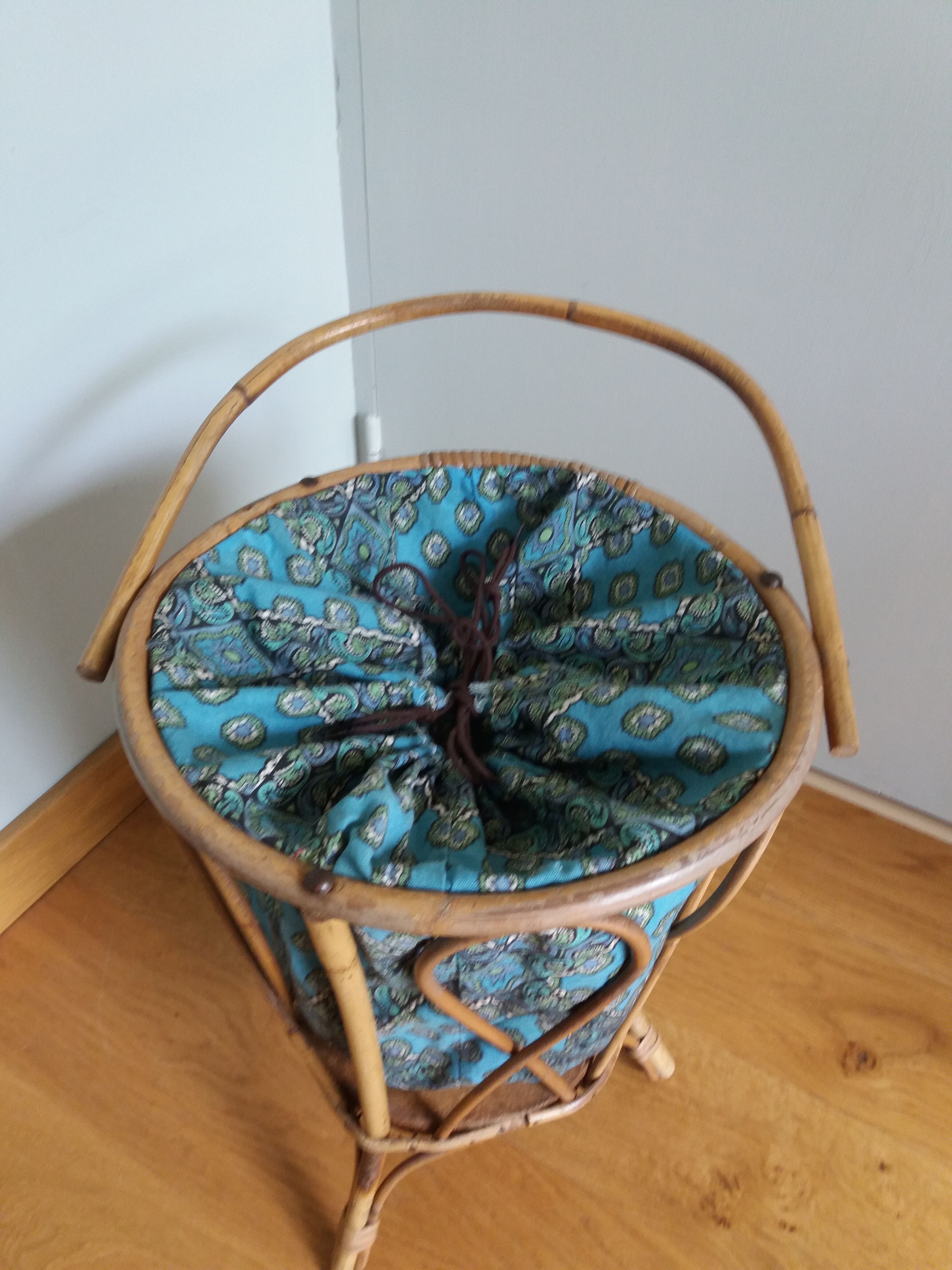 Wicker worker round basket with work, knitting