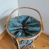 Wicker worker round basket with work, knitting