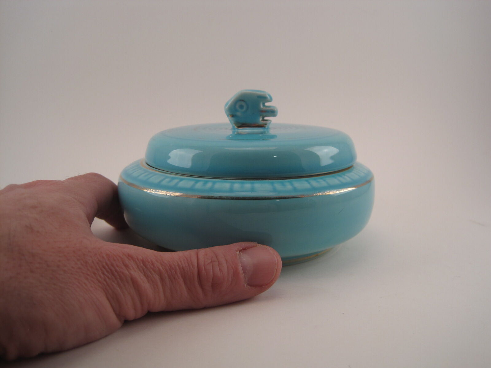 Turquoise blue earthenware candy box decorating stylized frieze fish Art Deco