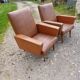 Paire de fauteuils vintage en skaï marron