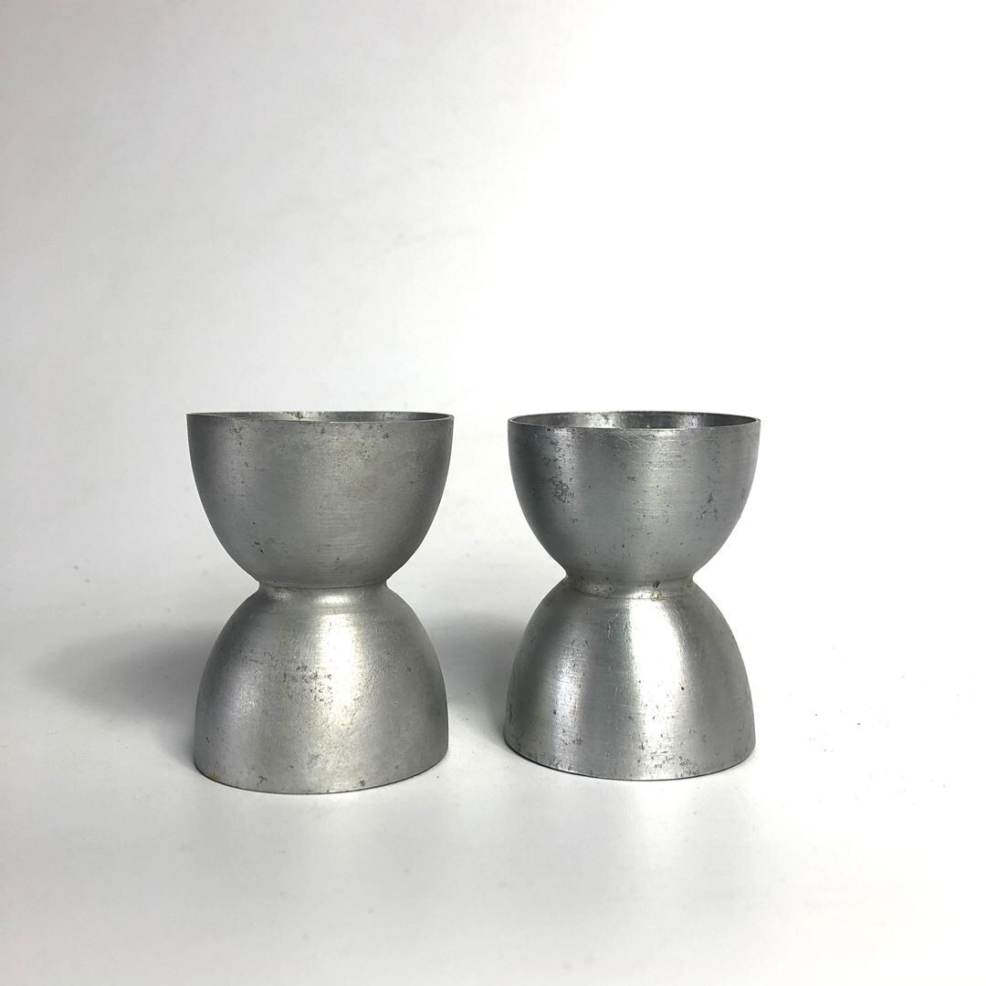 Lot of 2 old aluminum cockroaches