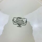 Plat rond Obernai en faïence de Sarreguemines, signé Loux