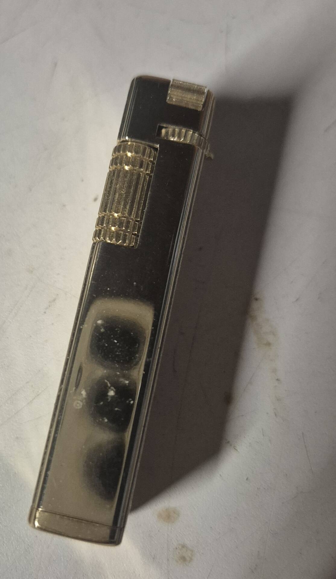 Vintage Scorpio gas lighter in its collector's case.