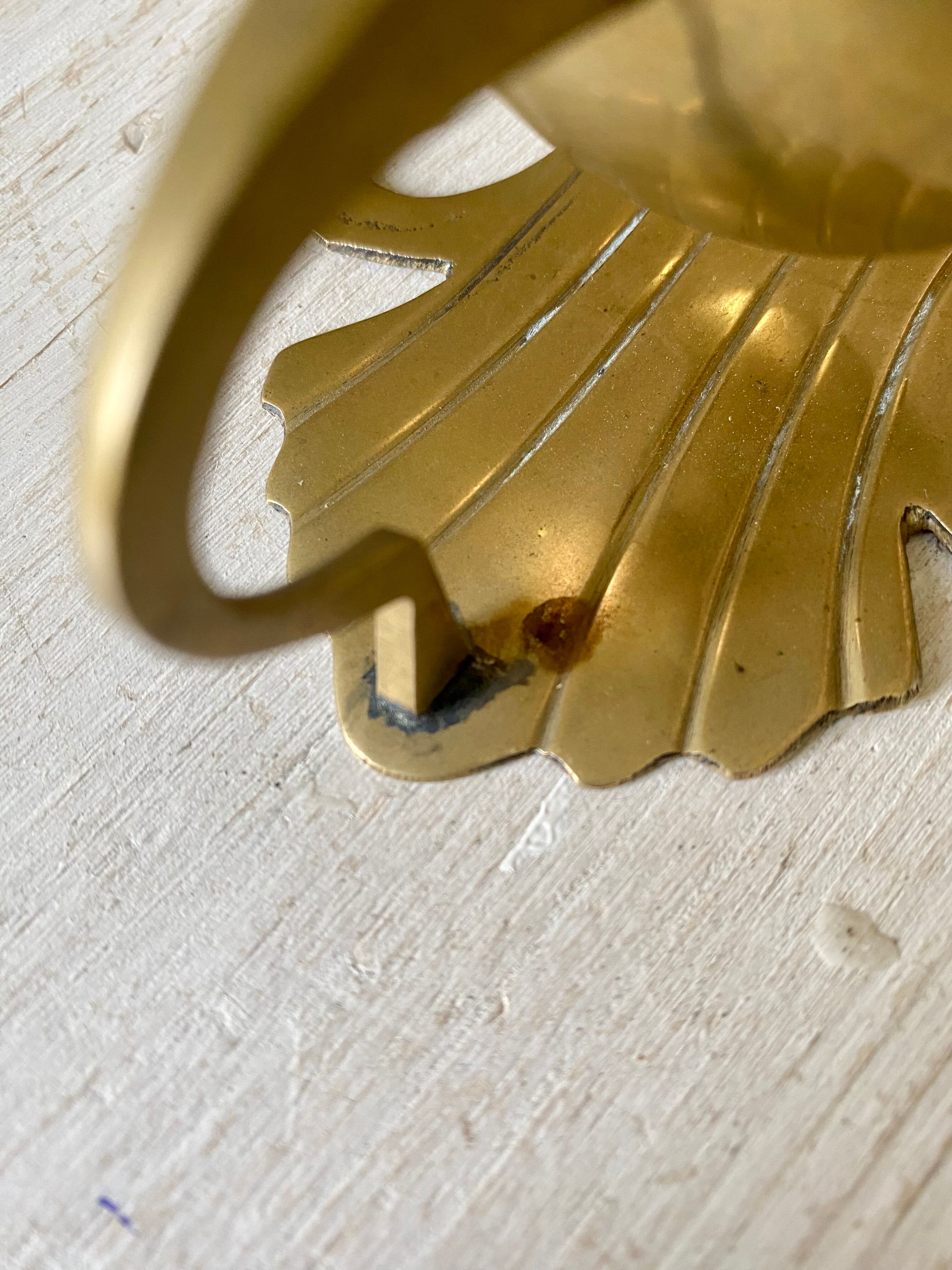 Pair of brass wall candle holders