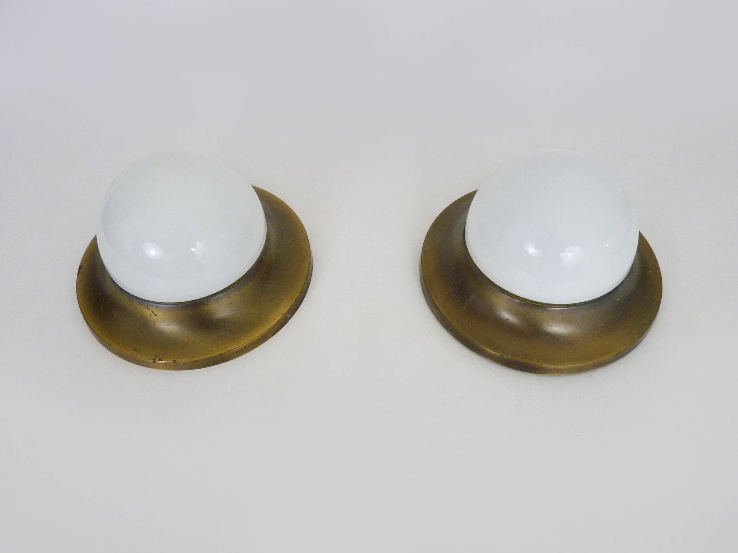 Pair of Space age wall lights made in Austria, Opaline gold metal. UFO