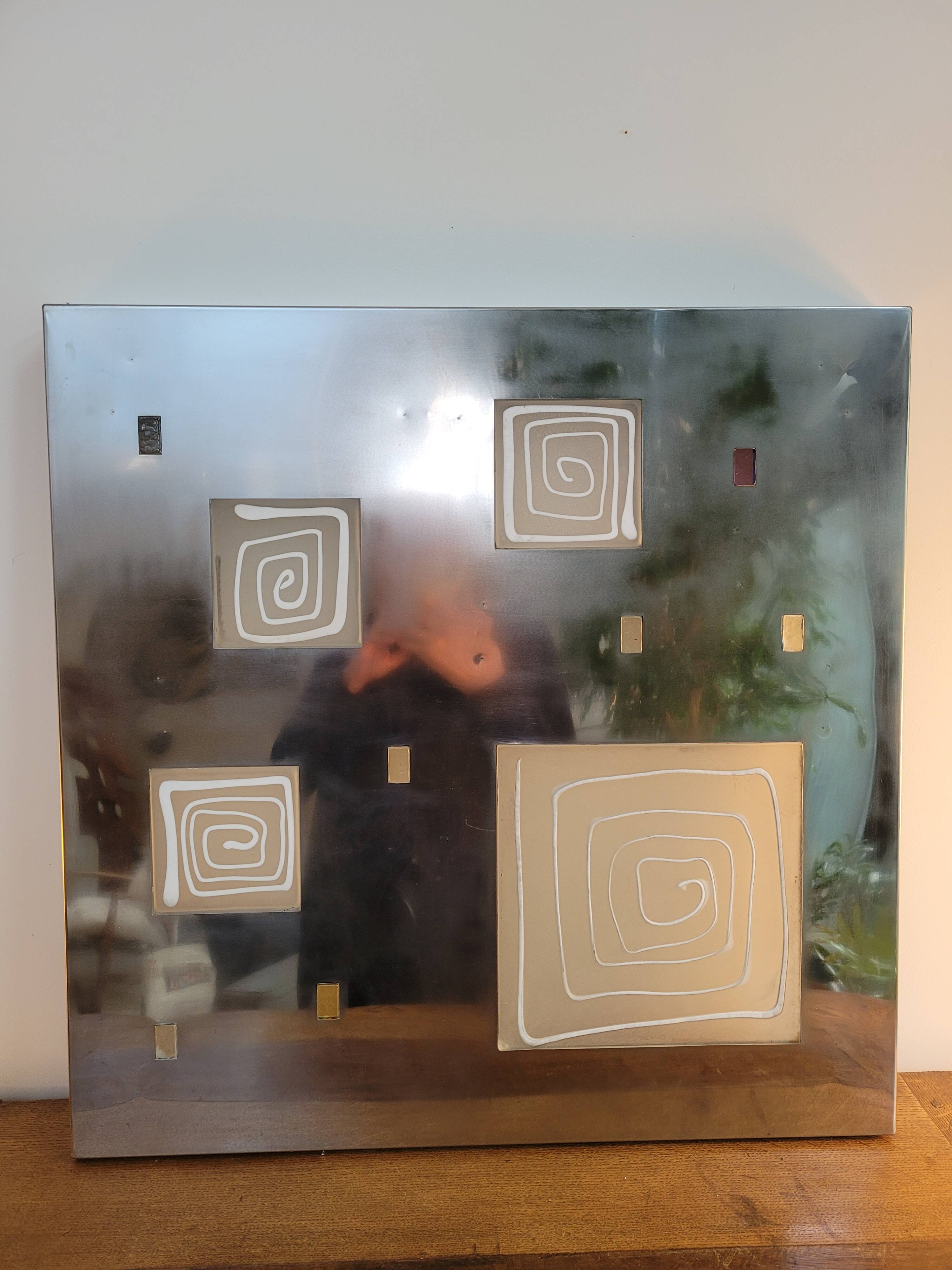 Wall light by Angelo Brotto, polished steel and Murano glass.